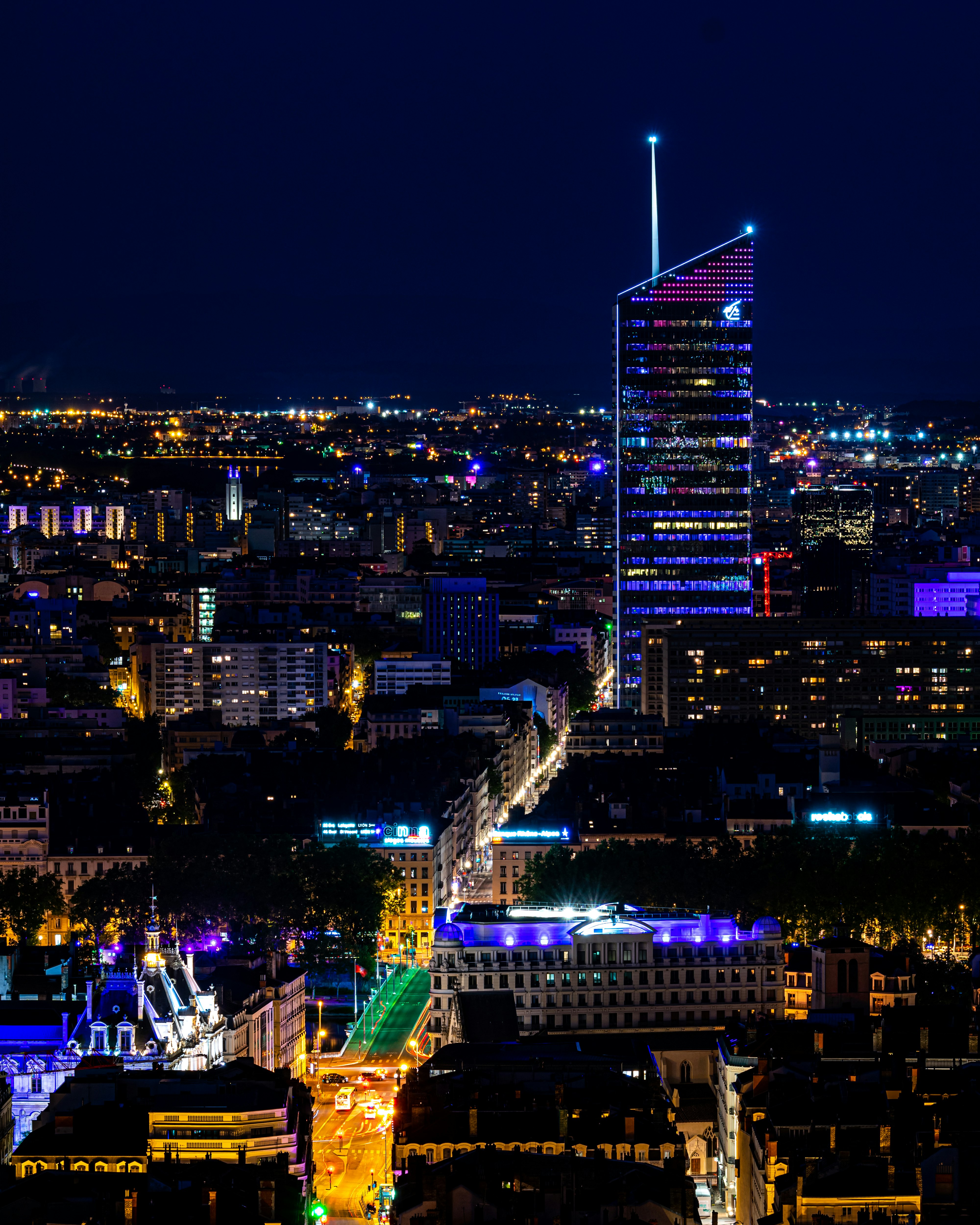 buildings with lights at night time